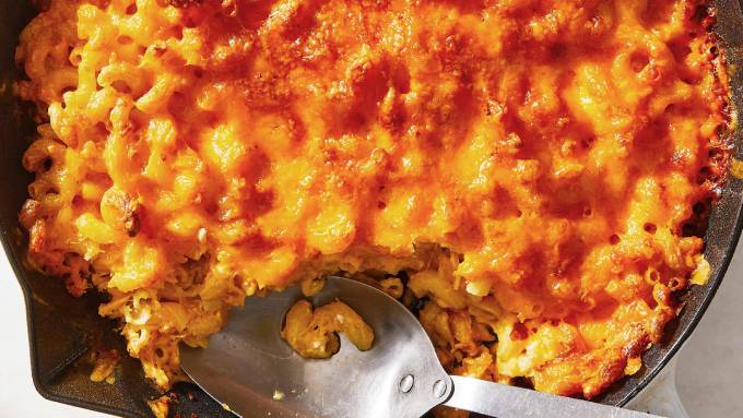 Baked Mac and Cheese proves that pasta Golden-brown baked mac and cheese in a skillet.