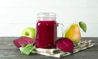 Fresh apple beet pear juice in a glass