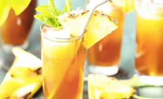 Glass of calming chamomile juice with fresh herbs