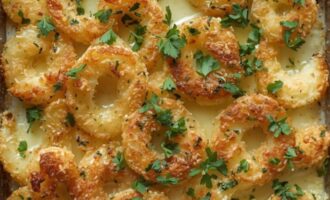 Garlic Parmesan roasted potatoes garnished with fresh parsley